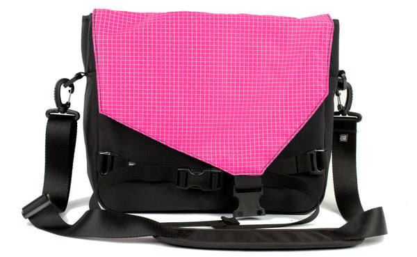 The Maker's Bag in Black Ballistic with a Cerise Halcyon lining.